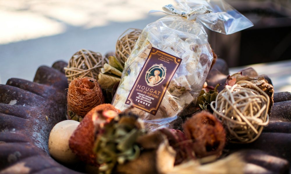 Bag of biscotti in a decorative bowl.