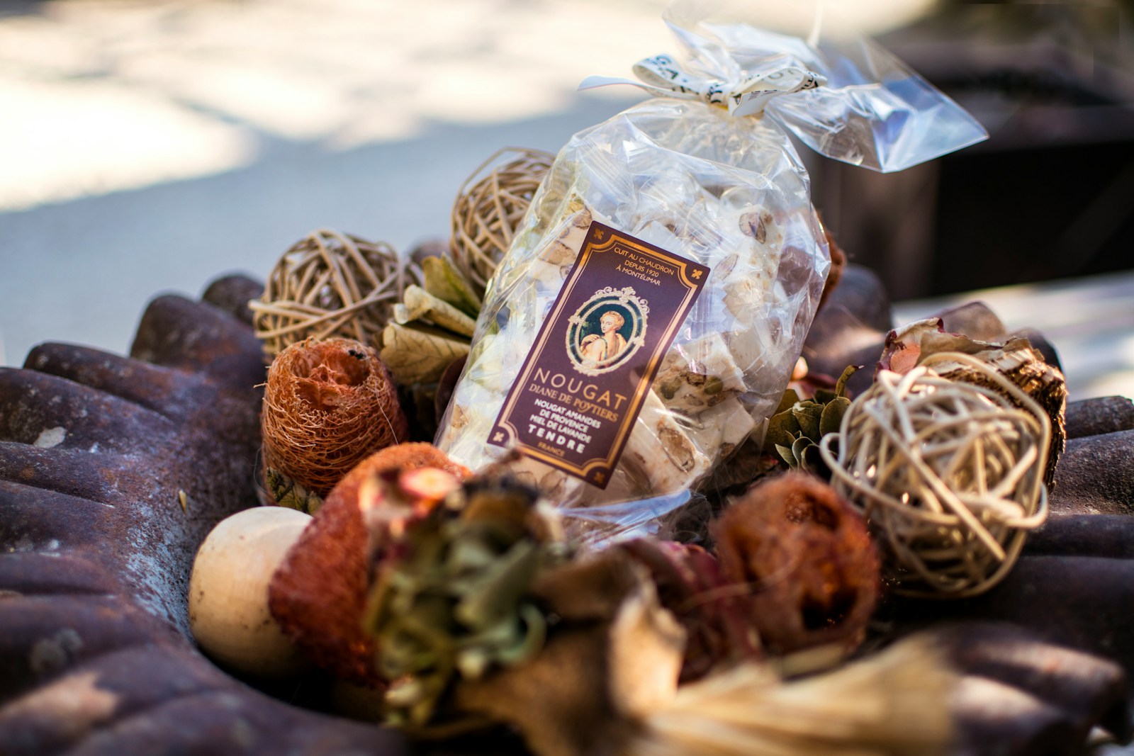 Bag of biscotti in a decorative bowl.