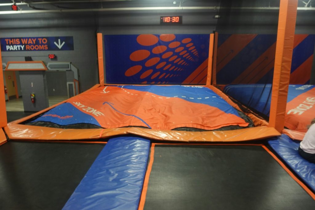 An indoor trampoline park is ready for fun.