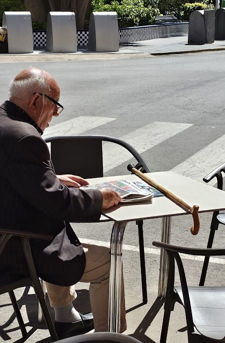 Torrevieja pensioners table newspaper coffee