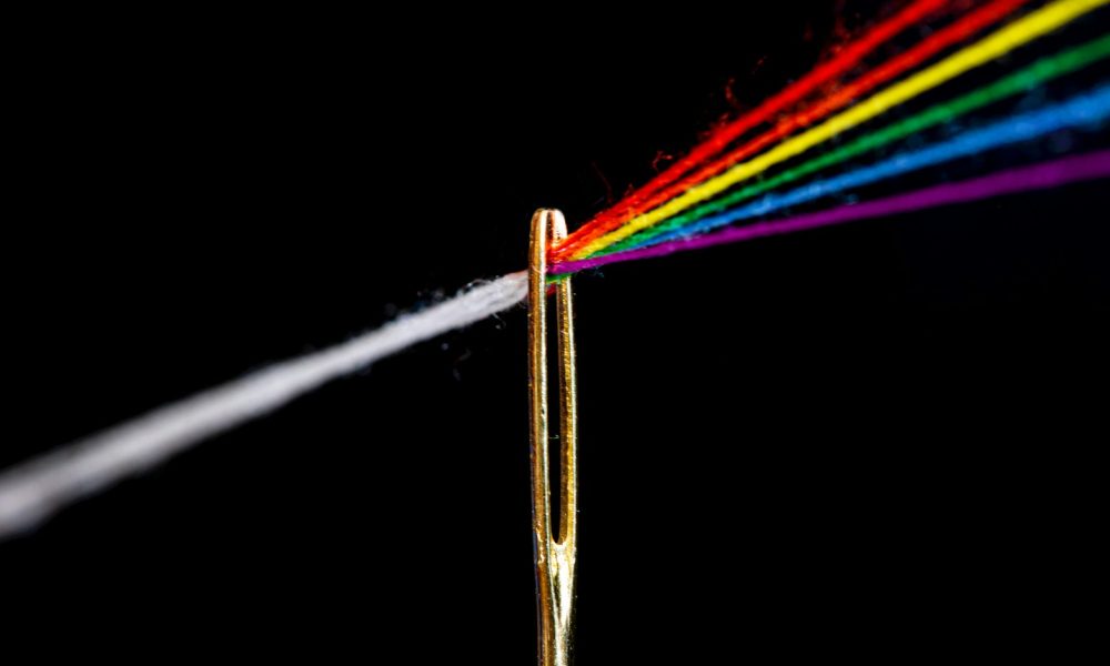 multi colored light streaks on white background